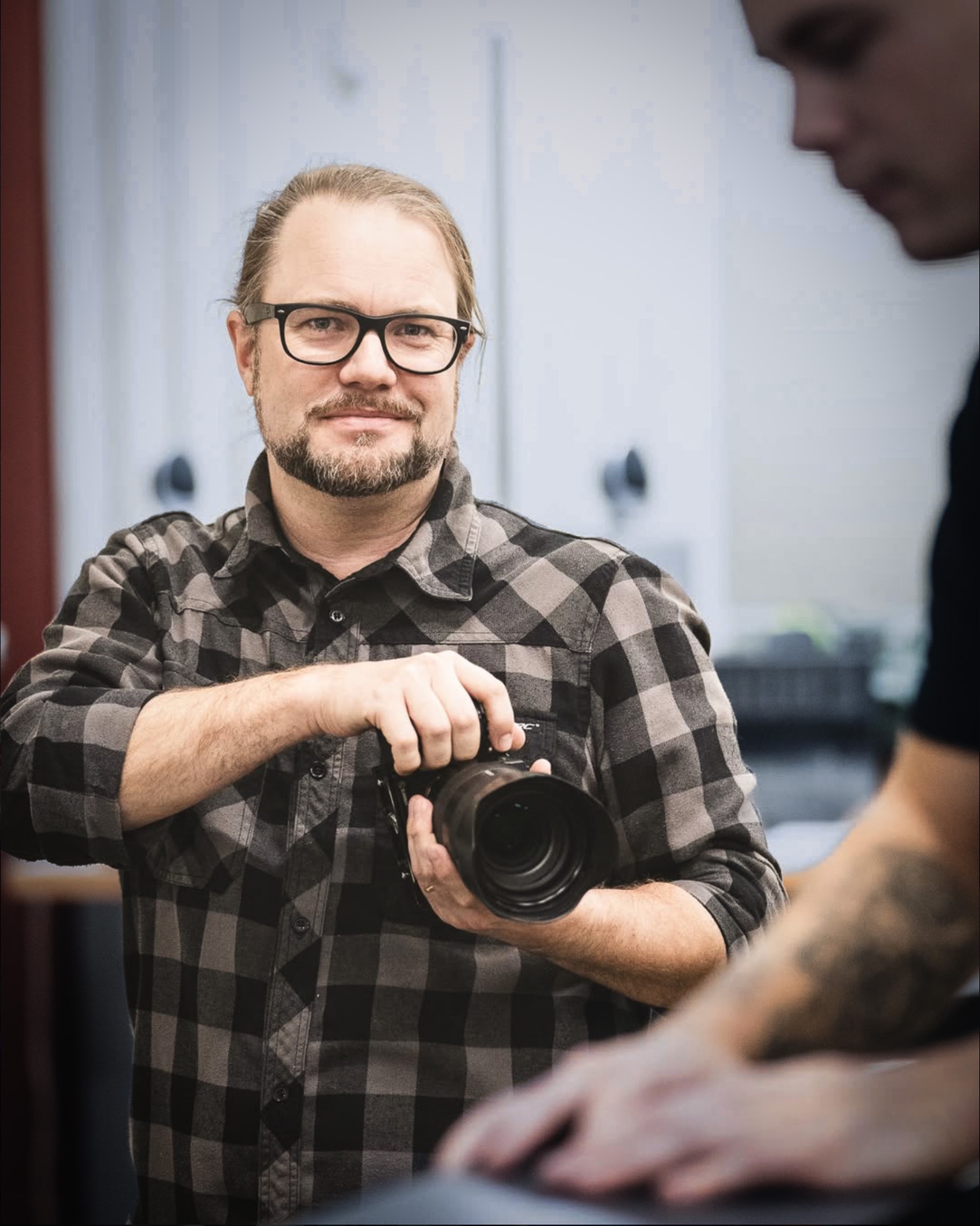 Porträtt av Daniel Larsson, fotograf